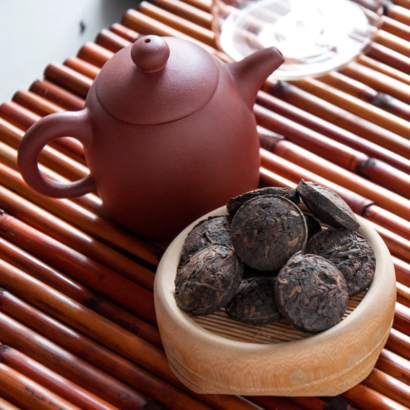 Pu erh-Steep 10 Year Aged Shu Pu-erh Tea-button(Ripe/Cooked Pu-erh) with Yixing Purple Clay Teapot